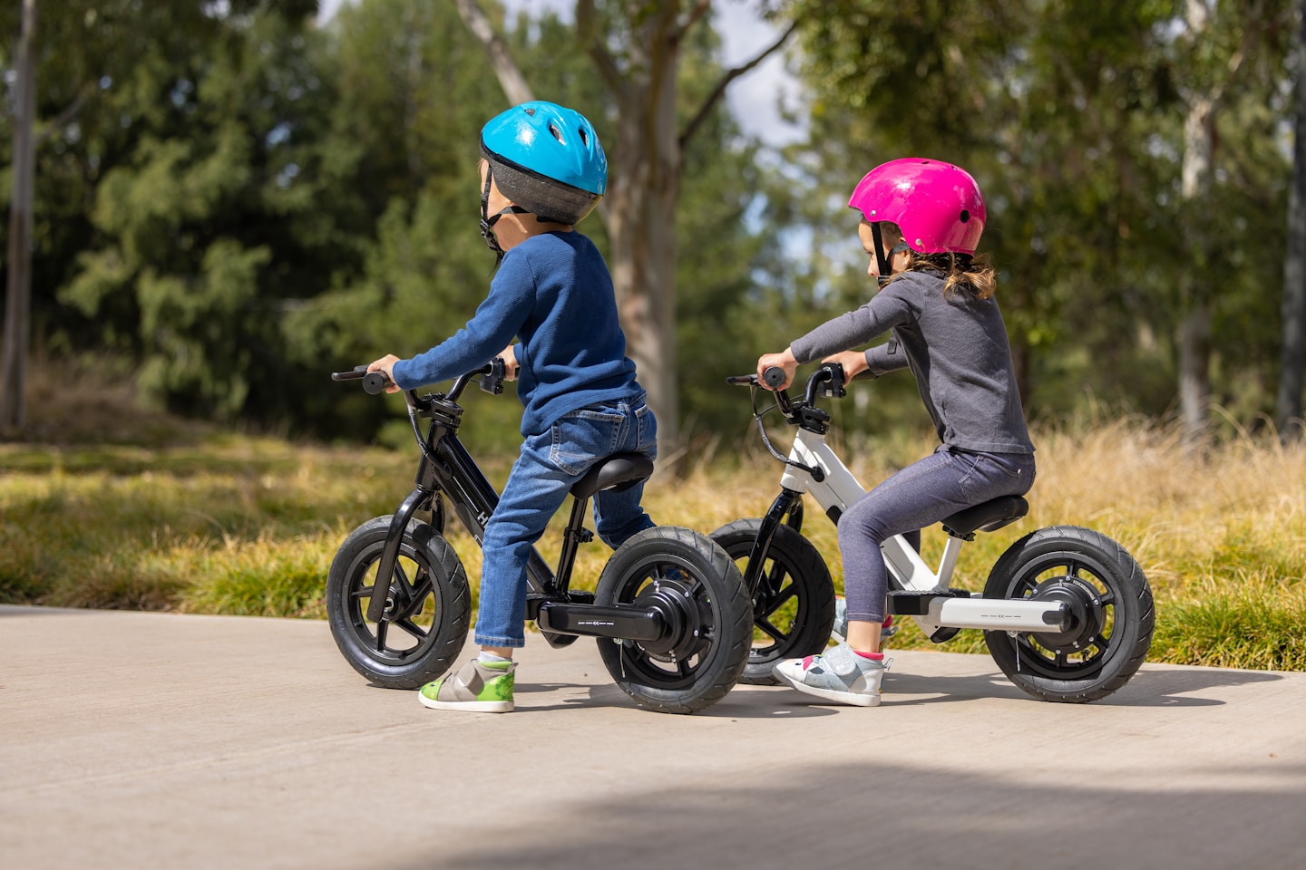 The child is riding with his partner.