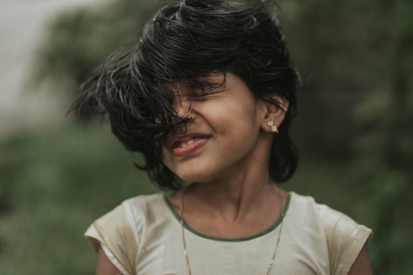 a close up of a person with a smile on their face
